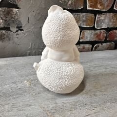 Limon üstünde oturan  Cüce